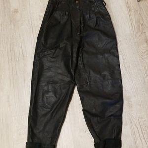 Vintage black leather pants. Paper bag waist.